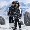 2023 NOWOŚĆ KICIE SKI SKI SKITURY BY DZIECKI Dziewczyny narciarskie spodnie Set Windproof Waterproof Snowboarding Ubrania Snowsuit Dzieci