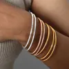 Bangle modieuze roestvrijstalen armband voor vrouwen rond minimalistische elegante gouden kleur armband dames accessoires populaire sieraden 240411