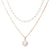 Neue modische doppelt geschichtete Perlenimitation hochgradige Halskette mit einem einfachen und eleganten Charmeanhänger für Damenkolarbone -Kette