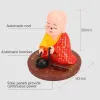 شمسية مدفوعة بالطاقة الشمسية تهتز رأس الرقص Toy Buddhist Monk Doll التماثيل تماثيل ديكورات لوحة اندفاعة السيارات