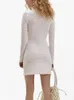 Casual jurken 2024 lente zomer witte of zwarte vrouwen elegante gebreide jurk uitgehold uit slanke o-neck dames mini gewaad met lange mouwen