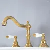 Rubinetti del lavandino da bagno a bacino oro lucido in ottone in ottone a doppia maniglia 3 fori e tocco di acqua fredda LNF982