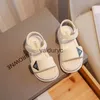 Sandals Girls casual sandals 2023 summer new childrens shoes girls in the middle and big baby soft soled fashionable beach H240411