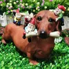 Konst och hantverk Arden Nome -statyer Utomhusdekor Dachshund Eatin Nomes Ornament Handikraft Blommorpotten Miniatyrer för hemmakontoret L49