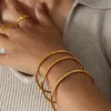 Bangle modieuze roestvrijstalen armband voor vrouwen rond minimalistische elegante gouden kleur armband dames accessoires populaire sieraden 240411