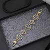 Projektantka klęska moda Twiggy Łańcuch Gold Letters Womens Bag Charm Keyring Stop