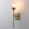 Permo Mid-Century Modern Bathroom Vanity Light Single Wall Sconce with Glass Globe Shade et Antique Brass fini Long bras