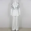 Dwuczęściowe spodnie damskie 2024 Autumn Wear White Fashion Sexy cekin elegancki top szczupły dopasowanie długi styl