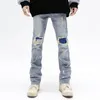 Spersonalizowane dżinsy w stylu American Style z trudnymi zamkami błyskawicznymi i fringe Hiphop Design Winter Prosty Fit Pants 240411