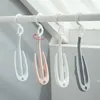 Artillo de zapato zapatos estantes colgantes de secado Balcón de hogar Hanger estante de colgilla Organizador de almacenamiento de zapatos gancho giratorio a prueba de viento seco