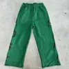 Pantalon masculin perdu des péchés en lâche couple de mode hétérose hommes moussin brodés pantalons de survêtement américain hipster de la rue américaine décontracté