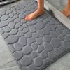 Mattes de bain Planchers de salle de bain cailloux texturés Porte absorbante 3D Foot en relief non glissement