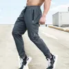 Zomer stretch Men Trackbroeken Casual kleding Elastische taille Jogging Mens Outdoor Training Fitness Adem lang 240411