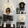 Conjunto de manga curta de verão infantil 2023 Novos meninos, t-shirt shorts top 2 peças 2 peças CAMO CAMO CRIANÇAS Terno de roupas 1-7Y