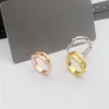 Anelli di banda di lusso in rame con designer di marchi mosse oro in oro 18k tre mobili zircone hollow rotond anello nuziale per donne regalo