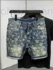 Mäns shorts designer sommar nya europeiska varor full kropp tryckt avslappnad mångsidig bulletless denim ungdomsslim fit 4/4 byxa tr8888 w3l0