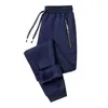 Pantaloni da uomo autunno inverno uomini in fila solido in rivestimento dei pantaloni maschili elastico tasche corsettoli da jogging lunghi pantaloni da jogging lunghi