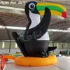 wholesale Inflatable Yellow Green Toucan Black Feather Model Animal With Orange Base For Zoo Visit Display Or Party Decoration