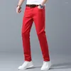 Pantaloni da uomo jeans jeans pantaloni di moda elastica slitta dritta coreana casual giallo rosa dei giovani