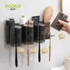 Ecoco -Zahnbürstenhalter Wand Zahnbürste Organizer Zahnpinsel Tasse Zahnpasta Squeezer Spender Badezimmer Zubehör Organizer