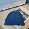 Mode beanies designer vinter bönor män kvinnor design stickade hattar fall ull cap jacquard unisex 100% kashmir brev fritidsskalle hatt utomhus