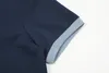 Designer Mens Basic Business Polos T-shirt Fashion France Marque T-shirts pour hommes Badges de lettre de brassard brodés Polo Shirtsa98