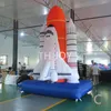 Livraison de porte gratuite Activités extérieures 8mh (26 pieds) avec ventilateur de fusée gonflable astronomique personnalisée ballon d'avion de roquette gonflable pour la décoration des événements publicitaires