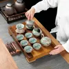 Ensembles de thé en céramique Thé à thé Chinaire en céramique Table domestique en bois massif de luxe avec plateaux à théâtre