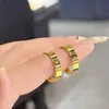 Designer -Charme Carter Sha Gold Ring Imitation Glossy Face für Frauen mit hohem Erscheinungswert Ehepaargeschenk verblasst nicht