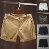 Shorts maschile uomini Summer Beach Elastico a medio elastico tasche a colori solidi design cargo streetwear