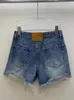 Shorts Shorts Fashion Denim Tasella Design a buco spezzato Design in alto in vita American Streetwear Wrap Hip Short Jeans Summer 2024 Ax64