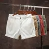 Shorts maschile uomini Summer Beach Elastico a medio elastico tasche a colori solidi design cargo streetwear