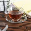 Tazas de tazas HouseeYou europeo Retro grabado Floral Glass Tea Cup Caucer Juego de tazas de té de 240 ml Café de porcelana avanzada Valentín Taza