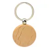 Porte-clés en bois 10 20 100pcs fermeture record de gravure ronde clés clés banc de bois blanks tags cadeaux