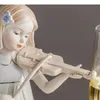 装飾的な置物バイオリニストの女の子かわいいフィギュア彫像机の装飾ミュージシャン磁器工芸モダンな塗装済みキャラクターセラミック彫刻