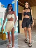 Summer Sexy Tassel Mulheres de duas peças Biquíni Conjunto de biquíni Halter renda sutiã Tassel Mini saia Terno de férias de praia Casual fêmea maiô 240411