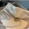 Retro Fashion Diamond-eingebettete Saturn Perlenkette weibliche Online-Influencer Leichte Luxus Full Diamond Planet Clavicle Kette Halskette Mode