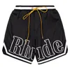 Rhude Men Brepwable Beach Shorts Men Femmes Casual Mesh Track Brewable Oversize Rhude Shorts Traws Short Freets Free Forward for Black and White Shorts 006 006