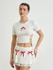 Werkjurken FUFUCAILLM Dames 2-delige outfits Leuke Bow Bandage Cutout T-shirt en elastische mini-rok ingesteld voor streetwear esthetische kleding