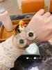 Moda pełna marka nadgarstka zegarki dla dziewczynki Kryształowy styl stalowy metalowy zespół kwarc z logo luksusowy zegar cho 04
