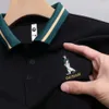 T-shirt d'été court avec collier de polo à broderie décontractée, haut surdimensionné d'âge moyen et jeune à manches mi-manches