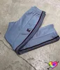 2022 Blue Igle Pants Men Women Wysokiej jakości brązowy brązowy pasek do paska haftowe motyle igły ślady spodnie AWGE spodnie T2208037069997