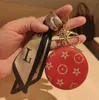 6Style Créativité Cosmetic Mirror Keychain Coin Purse Pending Charm Bijoux de cavalier Fashion Pu Leather Flower Grid Designer Metal Key Chain