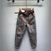 Dżinsy haftowe rozryte koreańskie spodnie z prostymi nogawkami Panie Streetwear Vintage Cute Flower Denim Spodni B05