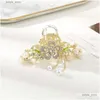 Coix de cheveux Haimeikang Rignestone Claw Claw Golden Bow Flower Clip Hairpin pour femmes Elegan Pony Pony Jode Accessoires Drop délivre OTUT7