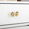 Light Luxury Bow Knobs Brass Furniture Bowknot Handtag och knoppar för köksskåphandtag Lådan drar heminredning hårdvara