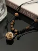 Pendentif bodhi perle en bois, collier de sécurité, nouveau conception de niche rétro de style chinois, assortiment à longue chaîne de cou