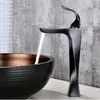 Grifos de lavabo de baño Manejo de carrocería de espiral negra grifo de latón sólido cubierta de latón montada y toque frío