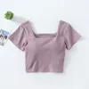 T-shirt sexy per donne abbigliamento da sonno a maniche corta One pezzi Tops del pigiama Bra Ladies bianche