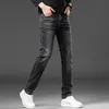 Heren jeans designer jeans voor herenlicht luxe Koreaanse editie dikke elastische voeten slanke jeugdblauwe en zwarte broek mu6f